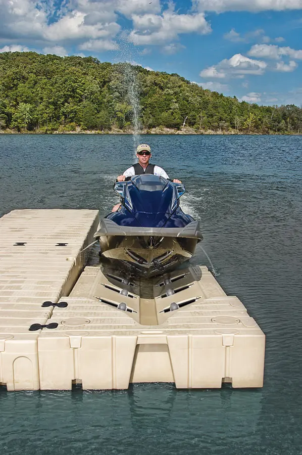 Dock with roller system for boat access